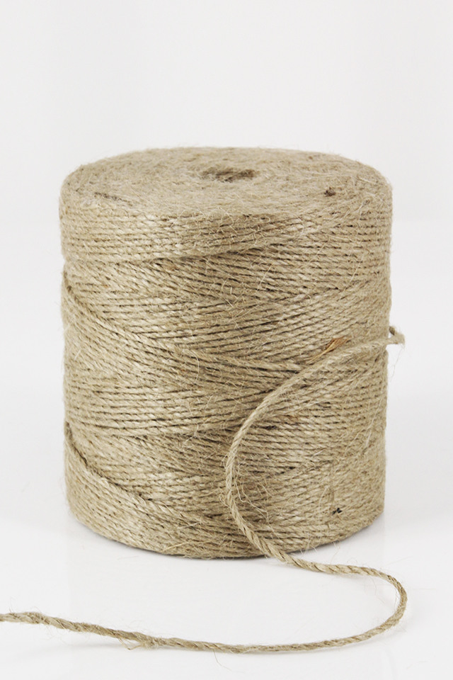 Premium Photo  Natural jute twine roll on white wooden